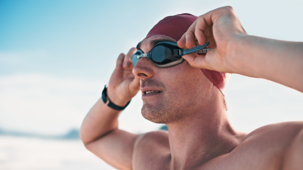 how to wear swim goggles